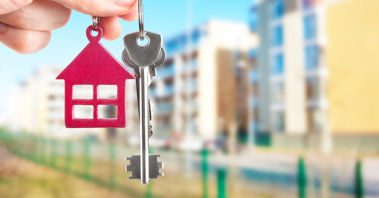 A person holding keys