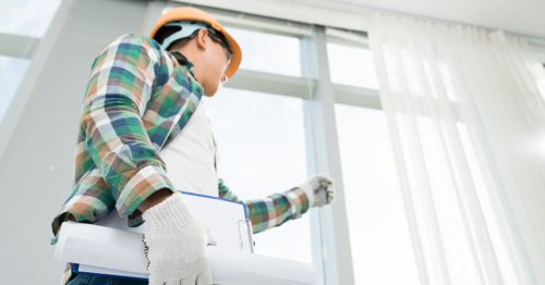 A building inspector checking a property