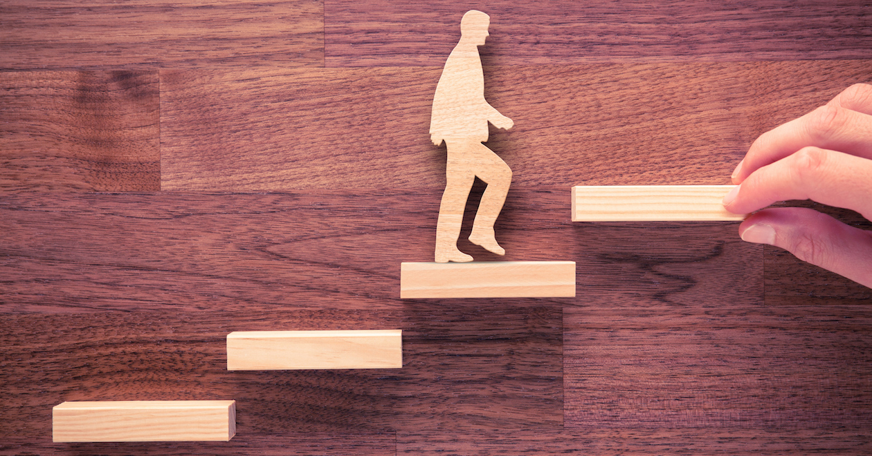 Man climbing career steps