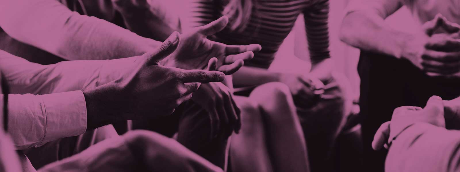 Close-up of group of people in discussion