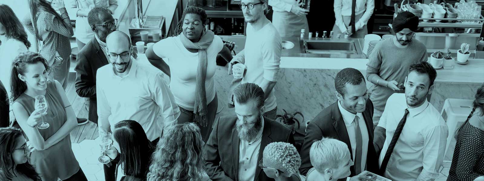 Large group of people talking at an event