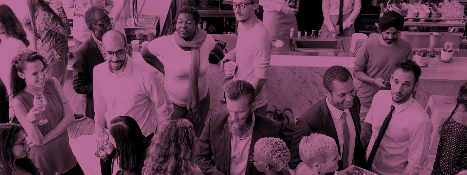 Large group of people talking at an event