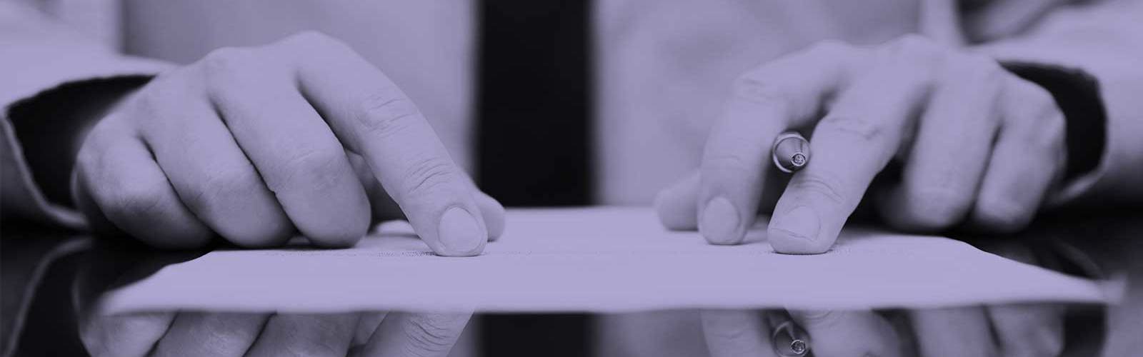 A person signing a contract