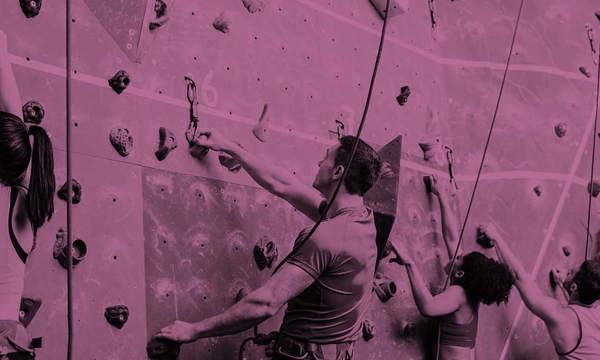 People on a rock climbing wall