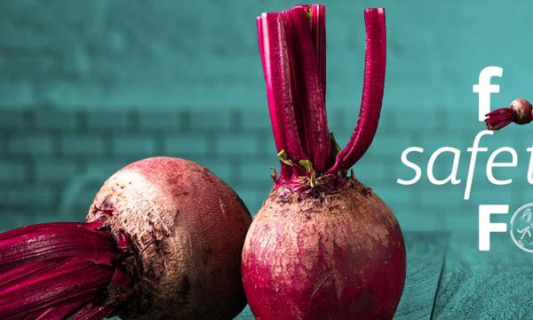 A photo of two beetroots with the words 'food safety focus'