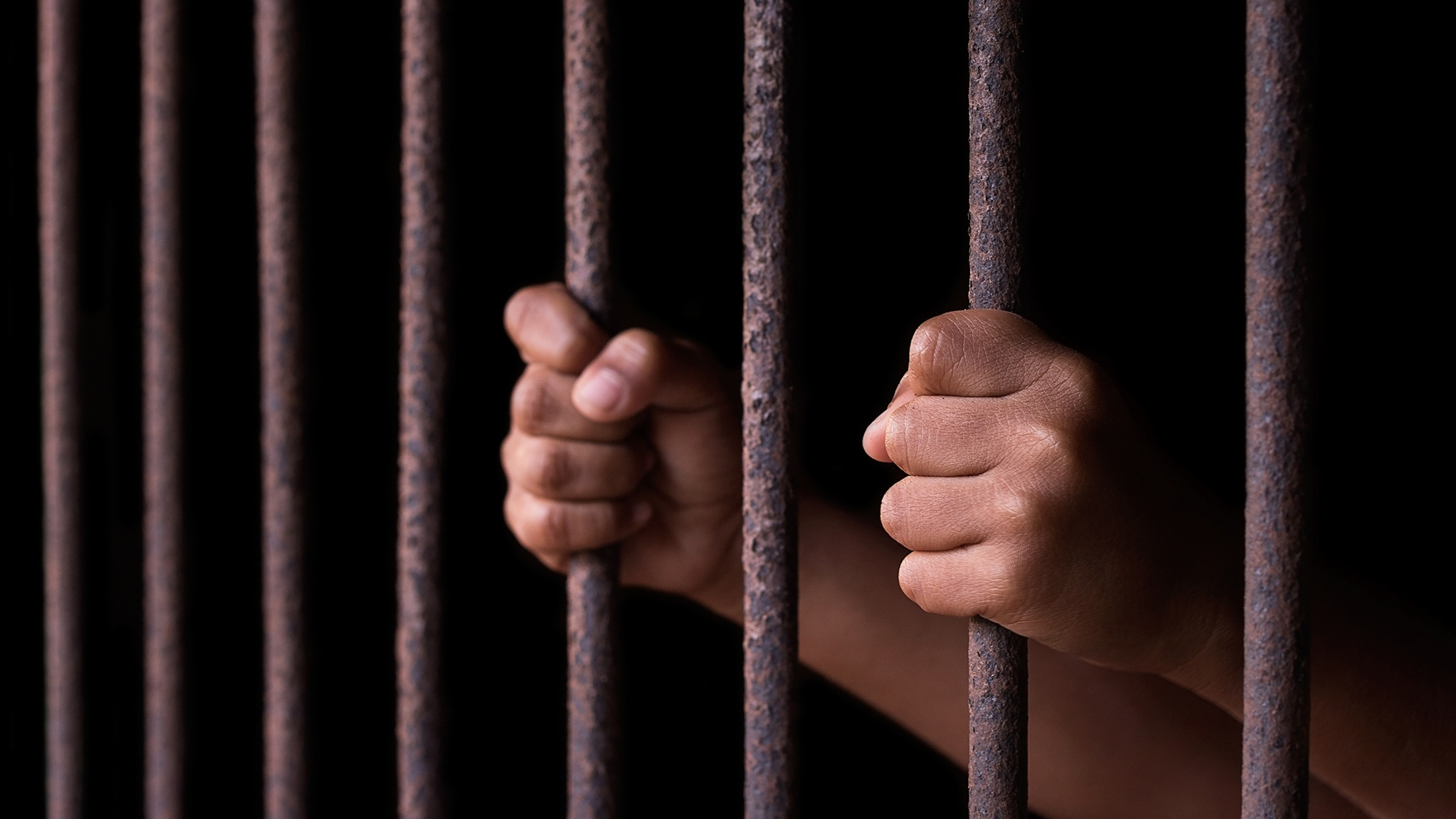 What is modern slavery and how does it intersect with environmental health?
