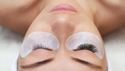 Woman with long lashes in a beauty salon