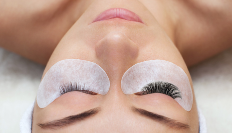 Woman with long lashes in a beauty salon