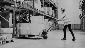 Man pushing a pallet truck