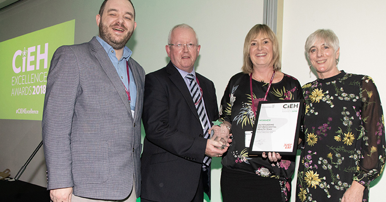Environmental Health Manager Wendy Brolly and Deputy Mayor Alderman John Smyth collect the Outstanding Environmental Health Team 2018 award on behalf of Antrim and Newtownabbey Borough Council Health and Wellbeing Team