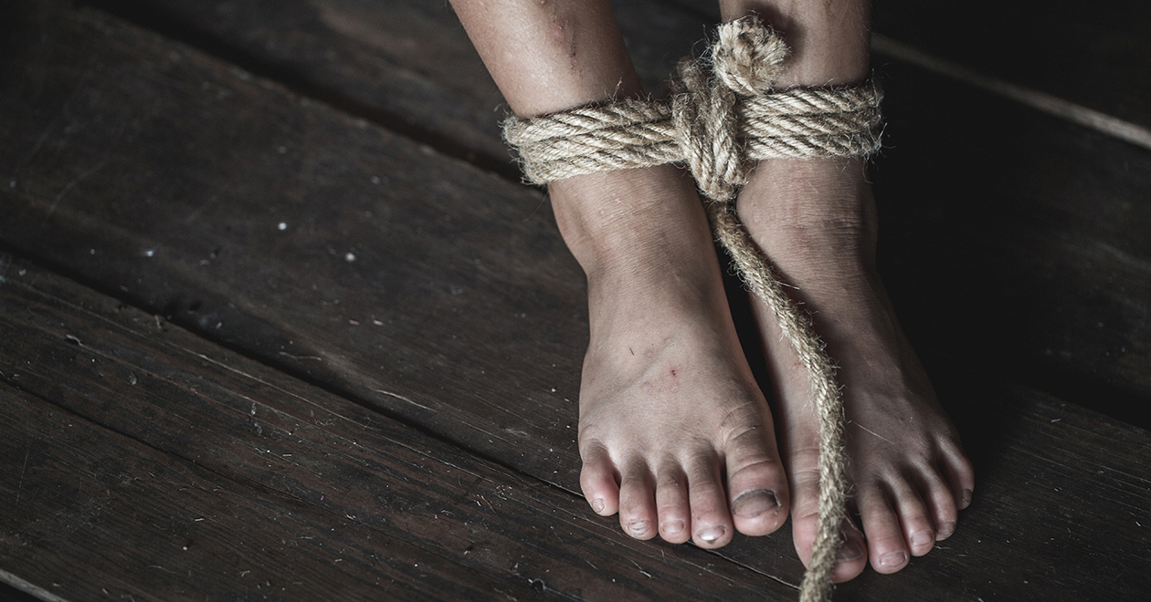 Feet tied up with rope