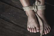 Feet tied up with rope