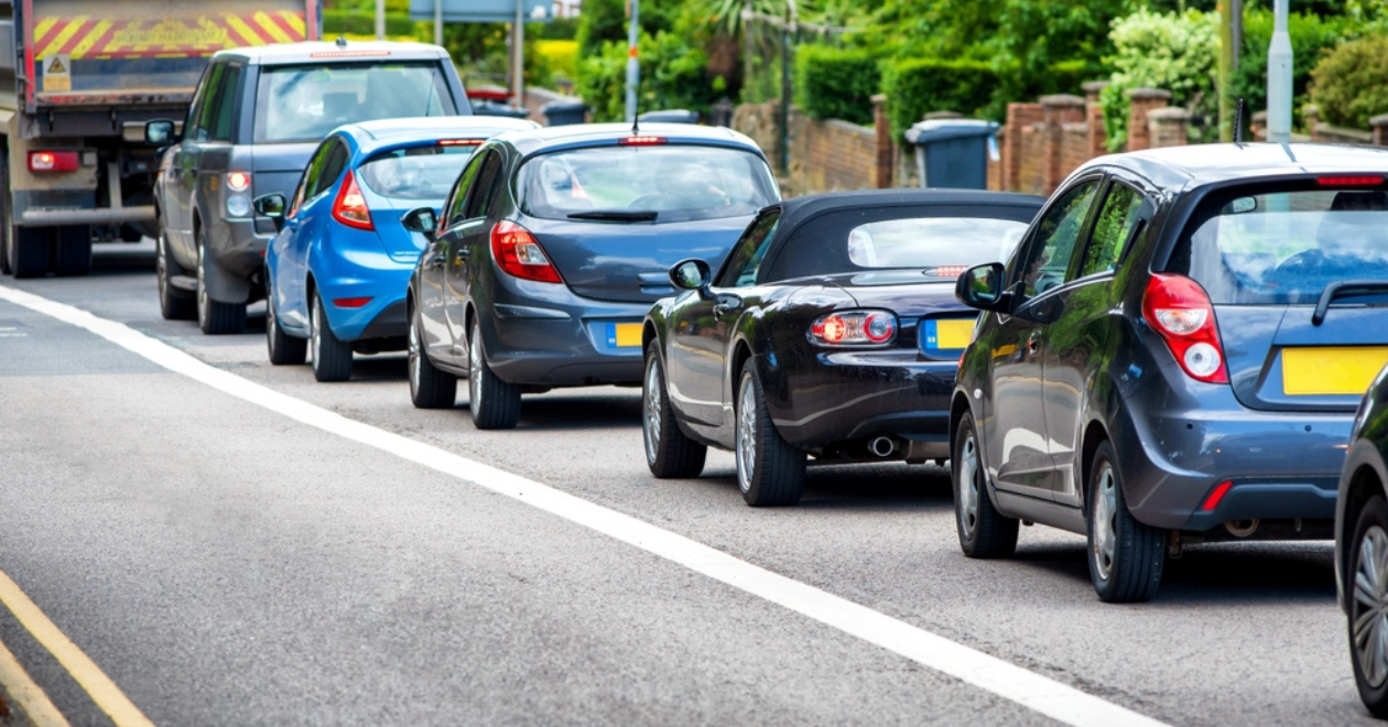 Heavy traffic jam next to bus lane in England UK