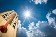 Thermometer with sun