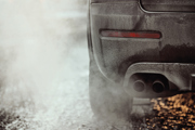 Car exhaust pipe with smoke