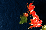 Satellite view of the United Kingdom, with Great Britain and Northern Ireland coloured red