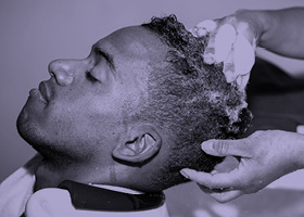 Man having his hair washed