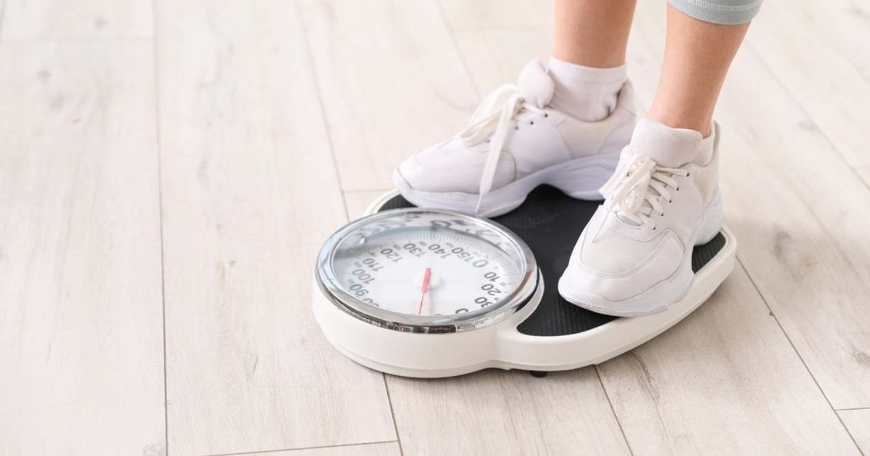 Feet on weighing scales