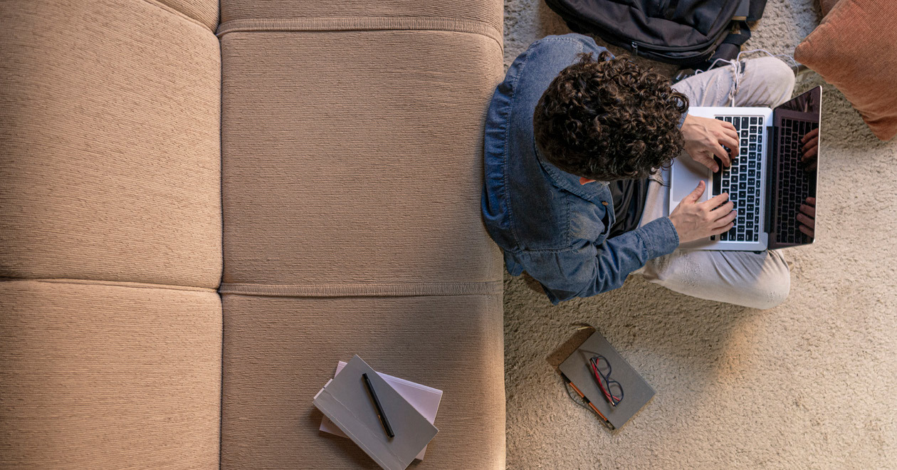 Birds eye view of man on laptop