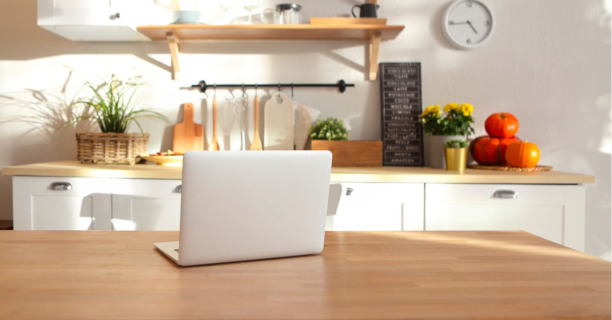 Laptop on a kitchen workbench