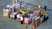 Food in crates being inspected in a port health warehouse