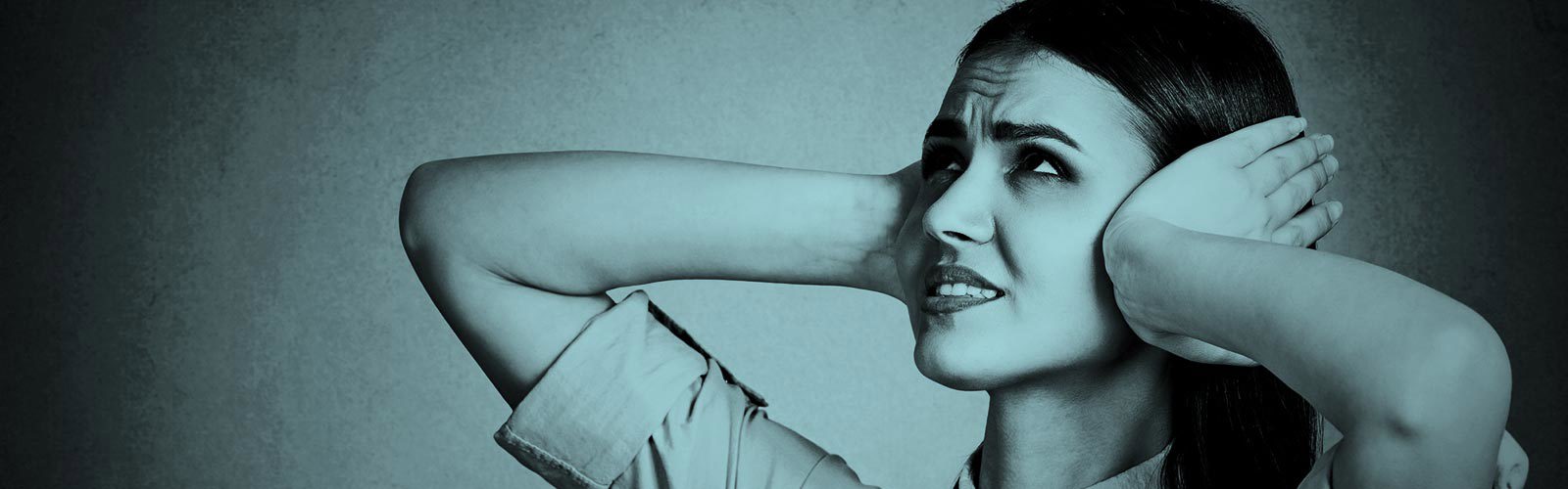 Person covering their ears