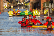 Flood rescue by the British Army and the Mountain Rescue at Queens Staith Road near the Ouse Bridge in York City Centre after heavy rain, on 27 December 2015