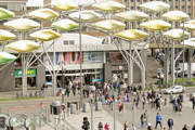 Pedestrians walking between the Stratford Centre and the main railway station in Newham, East London