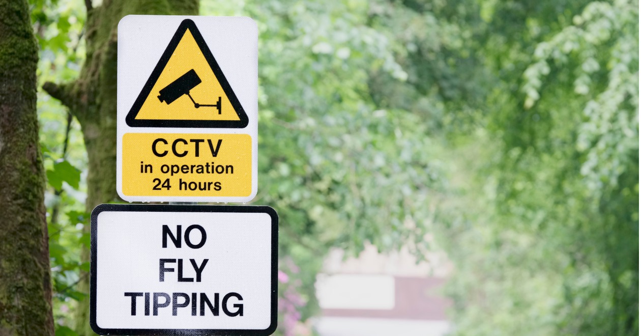 No Fly Tipping sign with trees in background