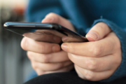 Close-up of woman's hands holding a smartphone