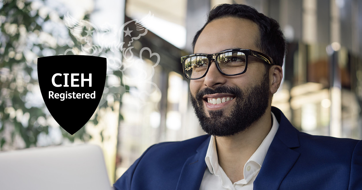 Man smiling with new CIEH credential badge