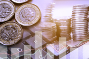 Image of coins stacked high