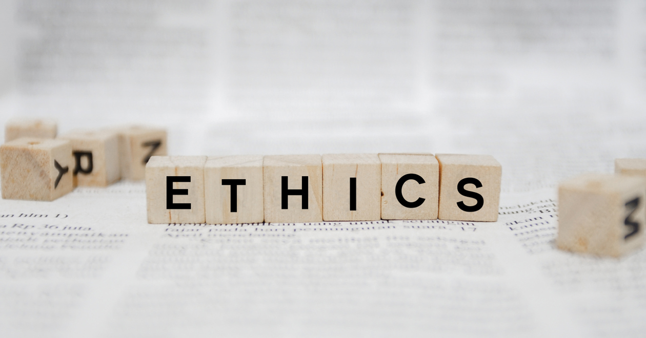The word 'ethics' written in wooden cubes