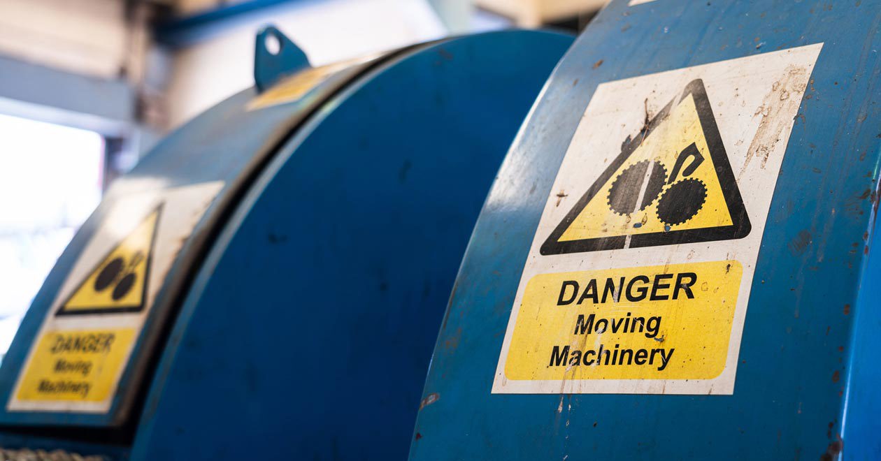 Danger sign for moving machinery