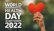 Hand holding a paper heart with the words 'World Environmental Health Day 26 September 2022'