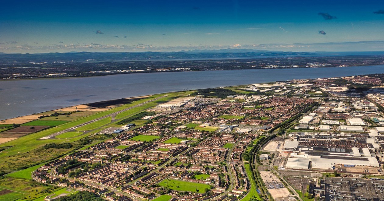 A bird's-eye view of a coastal city