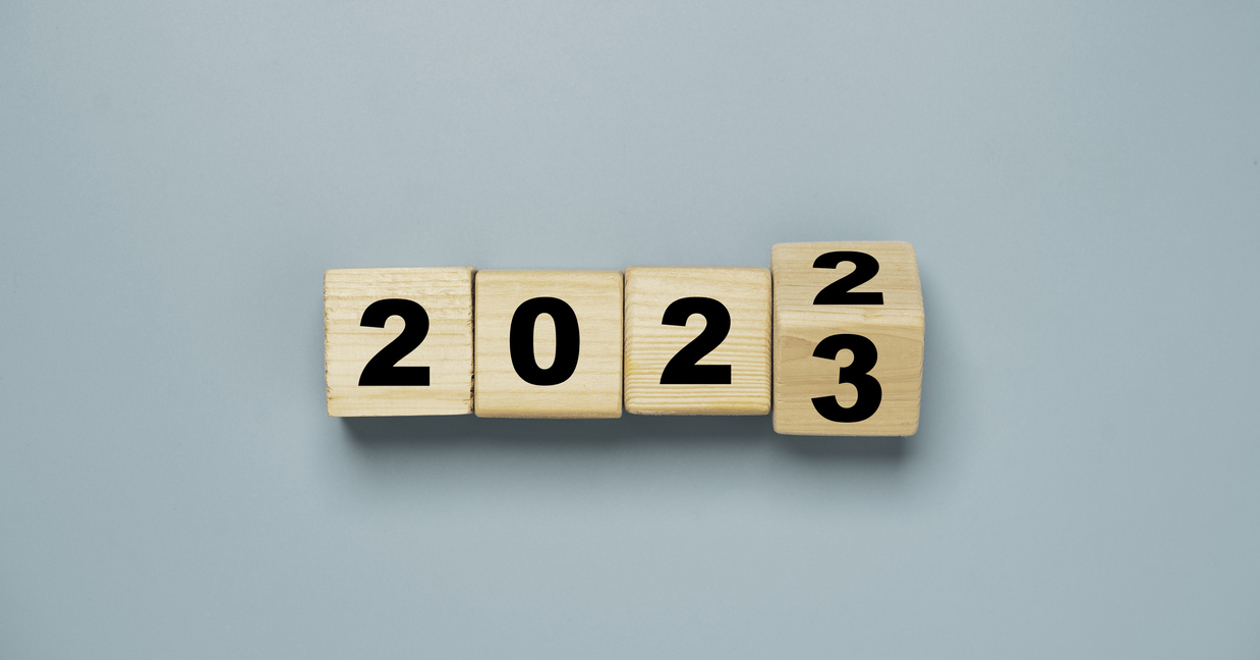 Wooden block cube flipping from 2022 to 2023