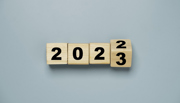 Wooden block cube flipping from 2022 to 2023