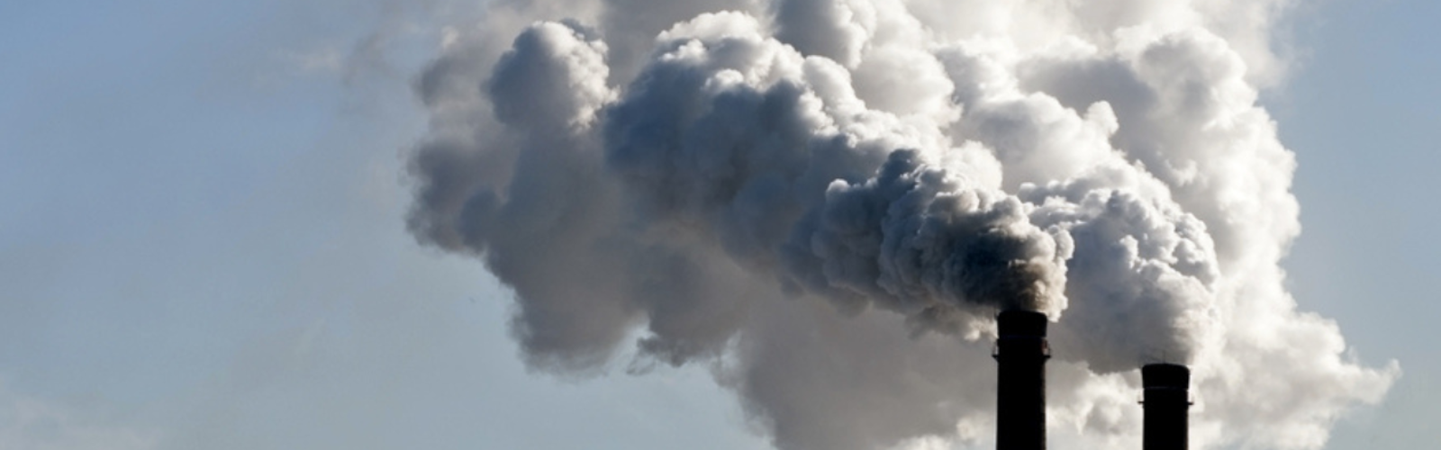 Emissions being spewed into the air from a power plant