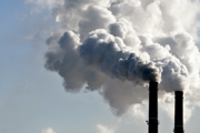 Emissions being spewed into the air from a power plant