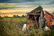 Fly-tipped waste in field