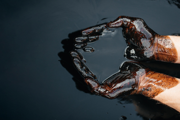Person holding chemicals