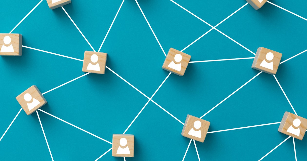 Wooden blocks connected together on a blue background