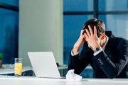 Stressed worker at desk