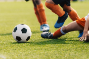 Kids playing football