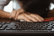 Man with head down on desk