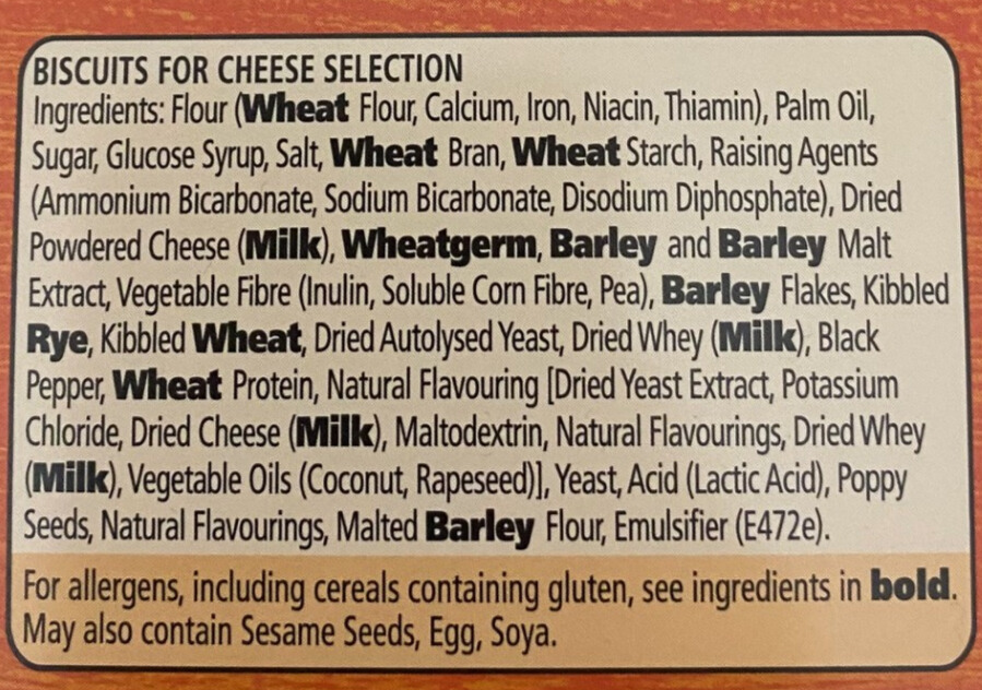 Food allergen label for biscuits with detailed ingredient list and allergens in bold, such as wheat, milk, barley, and rye. Includes advisory note about sesame, egg, and soya.
