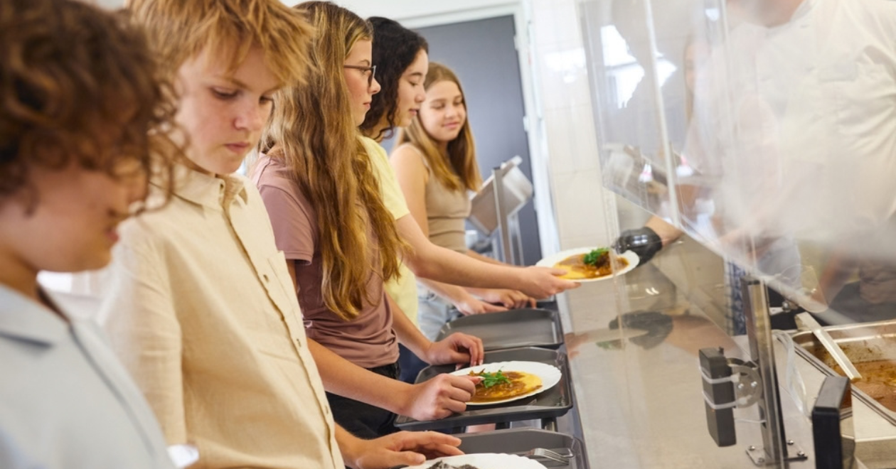 Children queuing up for school dinners